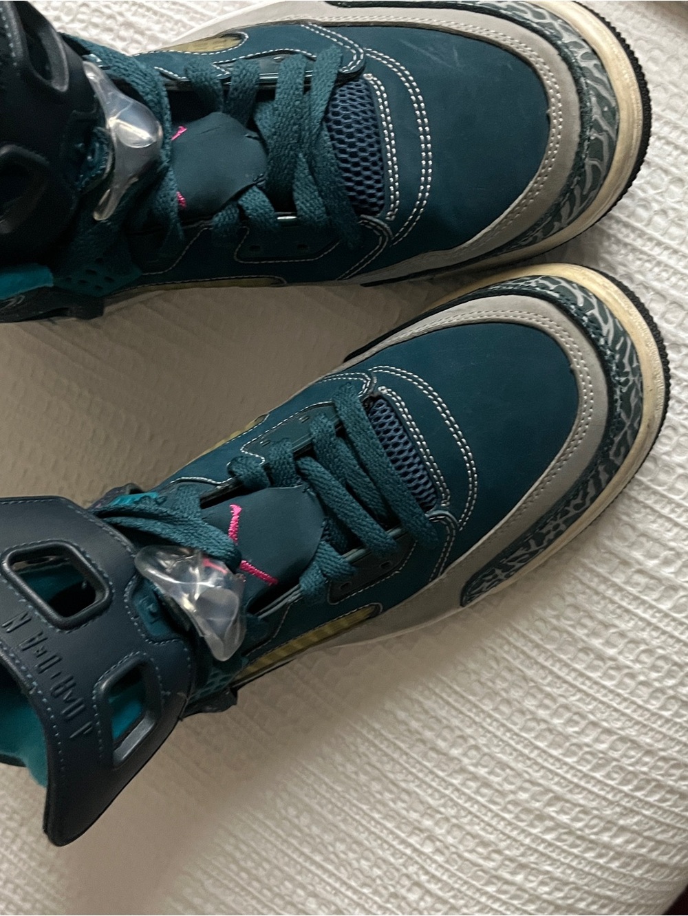 Jordan Spizike Space Teal and Gray Sneakers with Pink Accent.